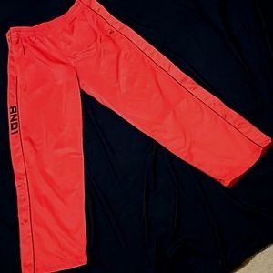 And1 breakaway warm up pants. Red and black. Men L